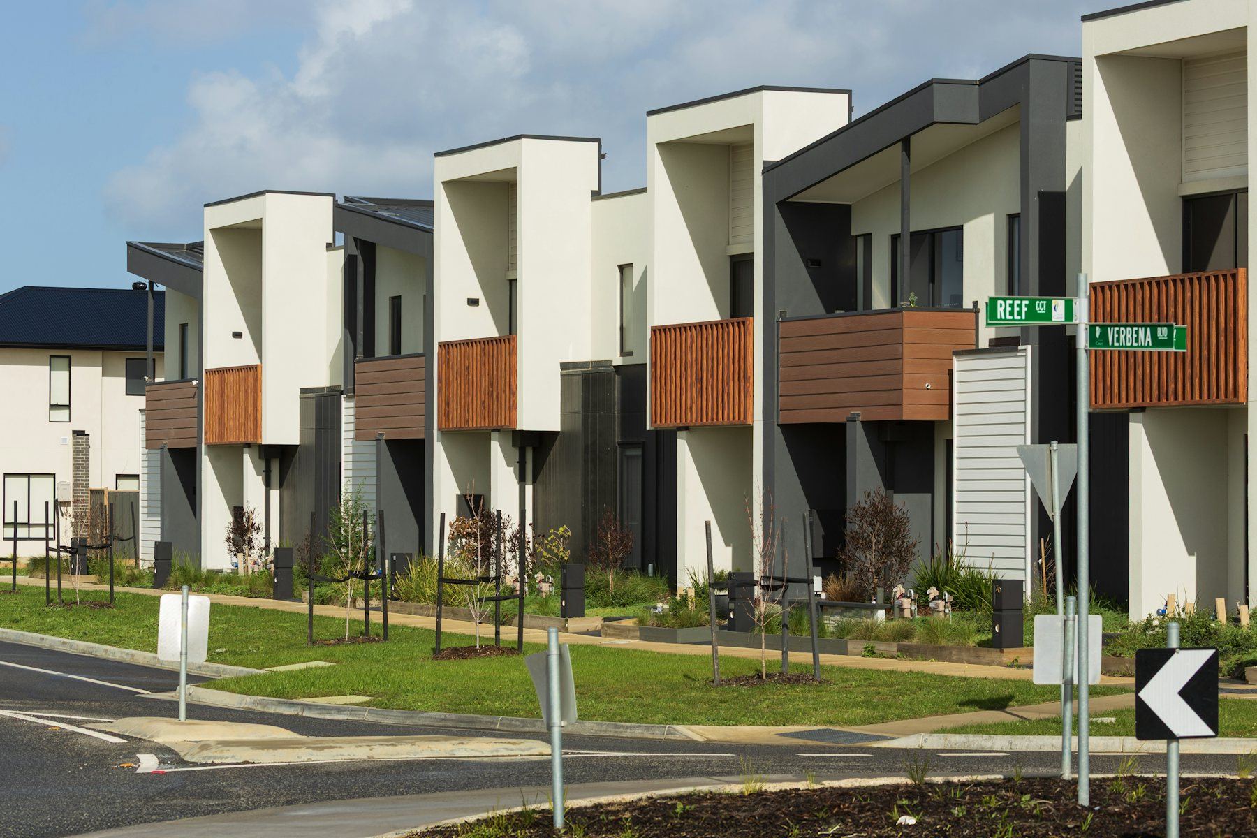 Contemporary townhomes along a residential street